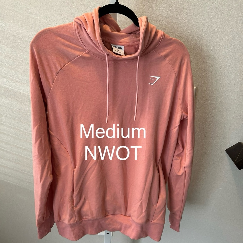 Gymshark medium light pink hoodie sweatshirt nwot 
Thin stretchy material